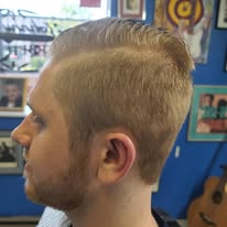 Fade haircut by Johnny's Down Under