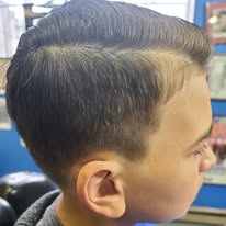 Comb-over fade haircut by Johnny's Down Under